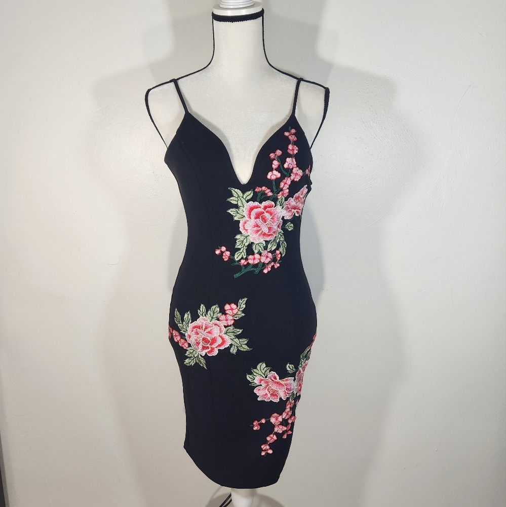 Akira Dress Size Small with Embroidered Flowers Deep V cut Midi length